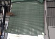 Sửa cửa cuốn bị bung ray